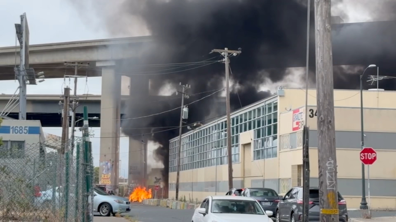 Crews battle fire near I-580 in Oakland